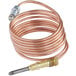A copper temperature probe with a gold-plated connector.