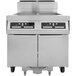 A Dean PowerRunner natural gas floor fryer with (2) 50 lb. frypots and built-in filtration.