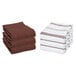A stack of Monarch Brands brown and white stripe pattern kitchen towels.