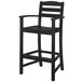A black POLYWOOD outdoor restaurant bar stool with armrests.
