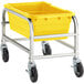 A Regency yellow wheeled lug rack cart.