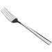 An Acopa stainless steel dinner fork with a silver handle.