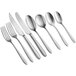 A group of Acopa Pangea stainless steel dinner forks.