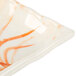 A close up of a white rectangular plate with a gold and orange orchid swirl design.