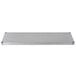 An Advance Tabco solid stainless steel rectangular shelf with screws.