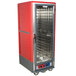 A red and silver Metro C5 moisture heated holding and proofing cabinet with a clear door.