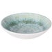 An Elite Global Solutions Monet melamine bowl with a speckled sea moss surface.
