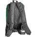 The back of a black Unger Excella backpack with green straps.