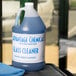 A case of Advantage Chemicals glass cleaner bottles on a counter.