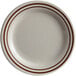 A beige melamine plate with brown speckled lines.