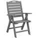 A grey plastic POLYWOOD folding chair with armrests.