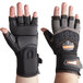 A pair of small black and orange Ergodyne ProFlex 910 heavy duty work gloves.