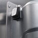 The stainless steel door of a Hamilton Beach HMD300 drink mixer with a switch.
