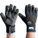 A pair of medium Ergodyne ProFlex thermal work gloves with blue and black accents.