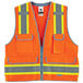 An orange Ergodyne heavy-duty surveyor vest with yellow and grey reflective stripes.