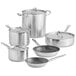 Vollrath Optio stainless steel cookware set with pots, pans, and lids.