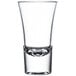 A clear Libbey shooter glass with a small bottom.