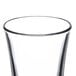 A close up of a Libbey shooter glass with clear glass.