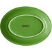 A palm green oval Acopa stoneware platter.