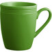 An Acopa Capri palm green stoneware mug with a handle.