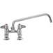 A silver Equip by T&S deck-mounted faucet with two lever handles.