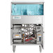 A Noble Warewashing carousel glass washer machine with blue plastic strips.