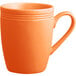 An Acopa Valencia orange stoneware mug with a handle.