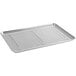 A Baker's Mark full size aluminum sheet pan with a stainless steel footed cooling rack on it.