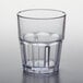 A clear plastic tumbler with a rim.