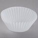 A white fluted paper baking cup.