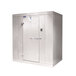 A white metal Norlake walk-in cooler box with a door open.