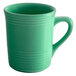 A Tuxton Cilantro green mug with a handle.