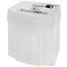 A white HSM Pure 120 paper shredder with a piece of paper in it.