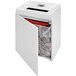 A white HSM Pure 530c paper shredder with a lot of paper inside.