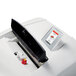 An HSM white paper shredder with a screen and red button.