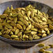 A bowl of Regal green cardamom seeds.