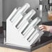 Choice White 4-Section Slanted Countertop Cup and Lid Organizer Main Thumbnail 5