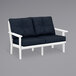 A white POLYWOOD loveseat with navy cushions.