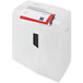 A white HSM ShredStar X14 paper shredder with red and white paper in it.