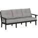 A POLYWOOD Lakeside black and grey deep seating sofa with cushions on a white background.