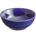 An Acopa Capri stoneware nappie bowl with a blue stripe on it.