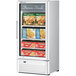 A white Turbo Air glass door freezer filled with frozen foods.