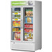 A white Turbo Air Super Deluxe swing 2 door freezer filled with a variety of frozen foods.