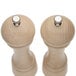 A Chef Specialties Windsor Natural Maple salt and pepper mill set with silver caps.