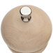 A wooden pepper mill with a silver top.