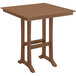A brown POLYWOOD bar height table with a square top and trestle legs.
