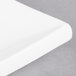 A close up of a CAC Tokyia bone white rectangular porcelain platter.