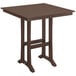 A brown POLYWOOD outdoor table with a wooden trestle top and legs.