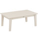 A sand POLYWOOD Lakeside coffee table with white legs.