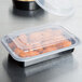 Pactiv Newspring NC8168B 16 oz. Black 5" x 7 1/4" x 1 1/2" VERSAtainer Rectangular Microwavable Container with Lid - 150/Case Main Thumbnail 13